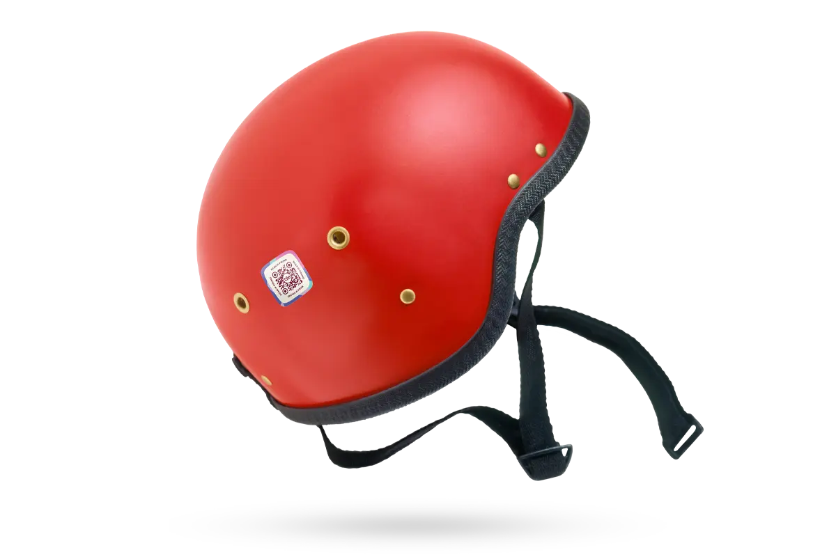 A Lost and Found Label placed on a red helmet.
