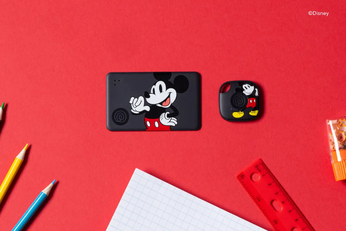 Image of a Tile Starter Pack - Mickey Mouse on a red desk