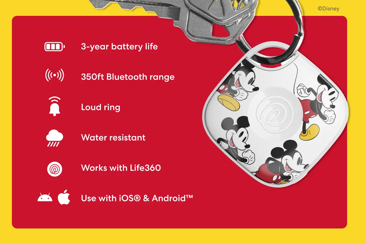 White Mickey Mouse-themed Life360 Tile tracker attached to a keyring. Feature list: 3-year battery life, 350ft Bluetooth range, loud ring, water resistant, works with Life360, use with iOS and Android.
