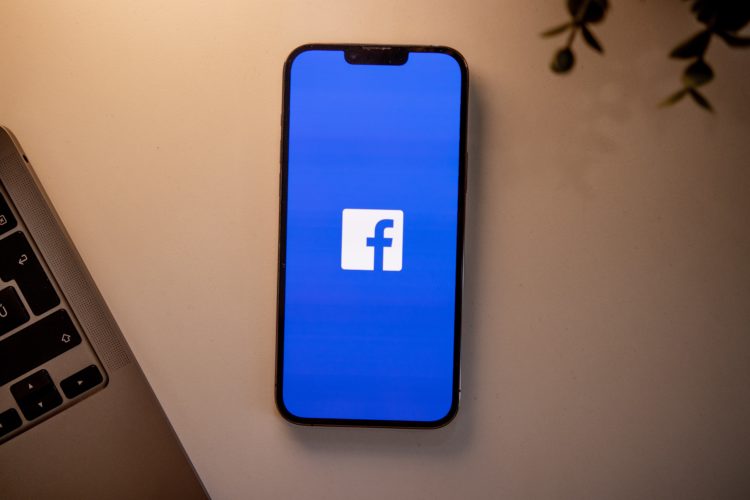 Facebook logo on phone